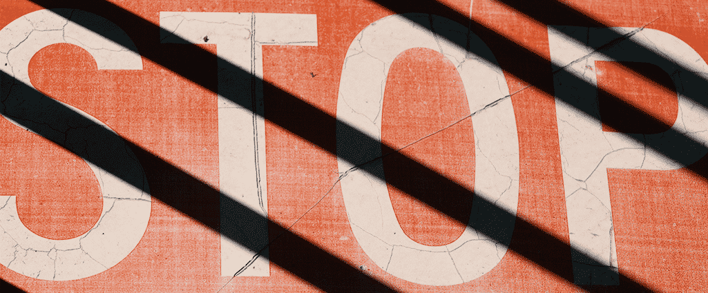 Banner with the word 'stop' with red strips. The limits set by Allah.